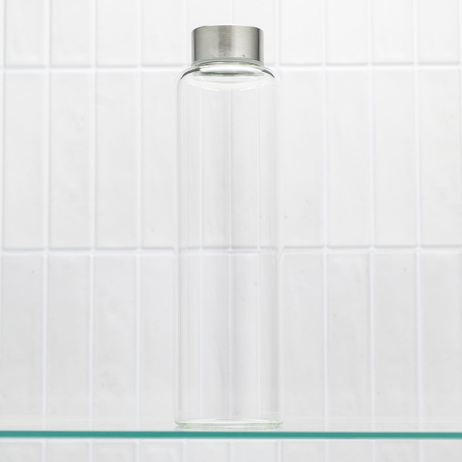 glazen waterfles voor onderweg met appelgroen hoesje